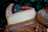 Abondance AOP French raw milk Cheese on a cheese board with bread and nuts
