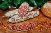 Hot Saucisson Sec. Aged French Salami made with Free Range Pork and chili on a chopping board