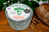 Award winning, Persille de Chevre Organic French goat blue Cheese on a cheeseboard. Full wheel